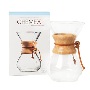 6 Cup glass Chemex coffee maker next to the box