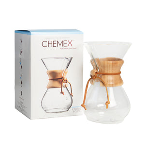 6 Cup glass Chemex coffee maker next to the box