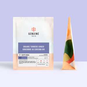 50g bag of Organic Turmeric Ginger tea, next to the side profile of the bag